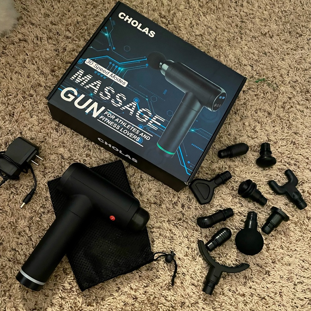 Cholas massage gun in box.